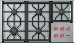Stainless steel cooktop with five burners and red control knobs for home cooking and kitchen improvement