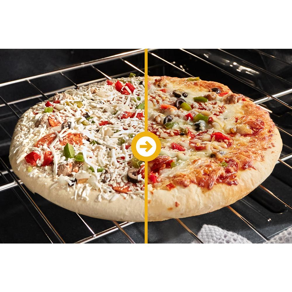 Side-by-side view of half uncooked and half fully baked pizza inside gas range oven for kitchen appliances use