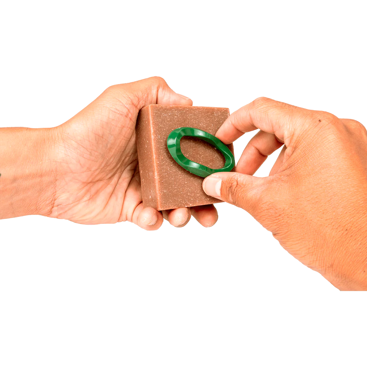 Hands holding brown soap and attaching green oval soap gripper for better control in Health & Beauty under $50 collection