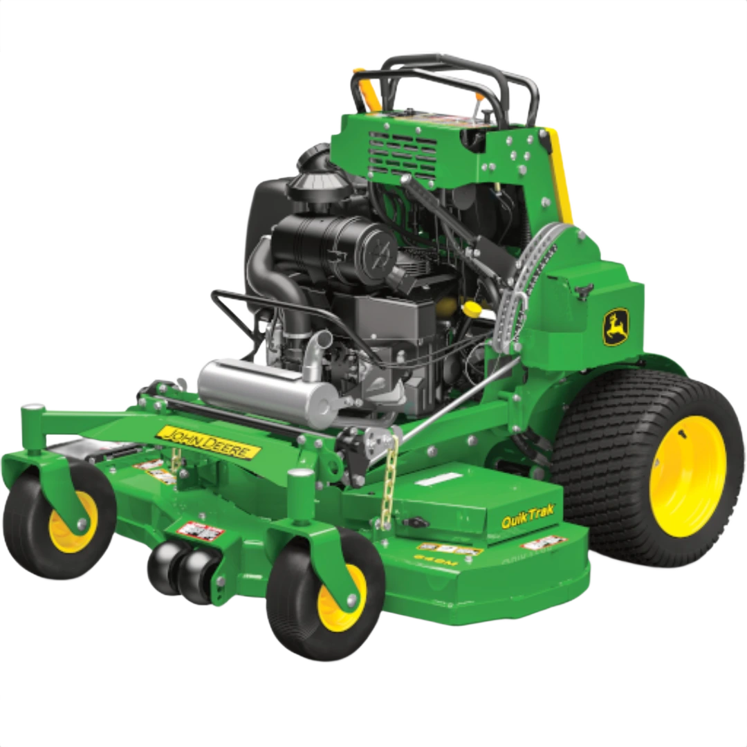 Green and yellow commercial stand-on mower with heavy-duty tires and exposed engine for landscaping tasks