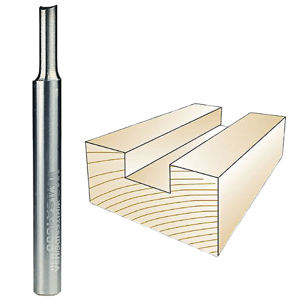 Carbide straight router bit alongside wood block showing clean routed groove for tool accessories and home improvement