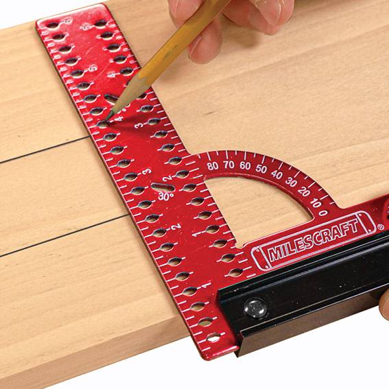 Red precision angle measuring square with imperial scale and protractor for woodworking and home improvement tasks