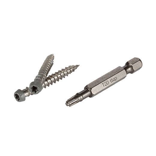 Two metal screws with hex drive heads next to a T20 torx driver bit for decking and home improvement projects