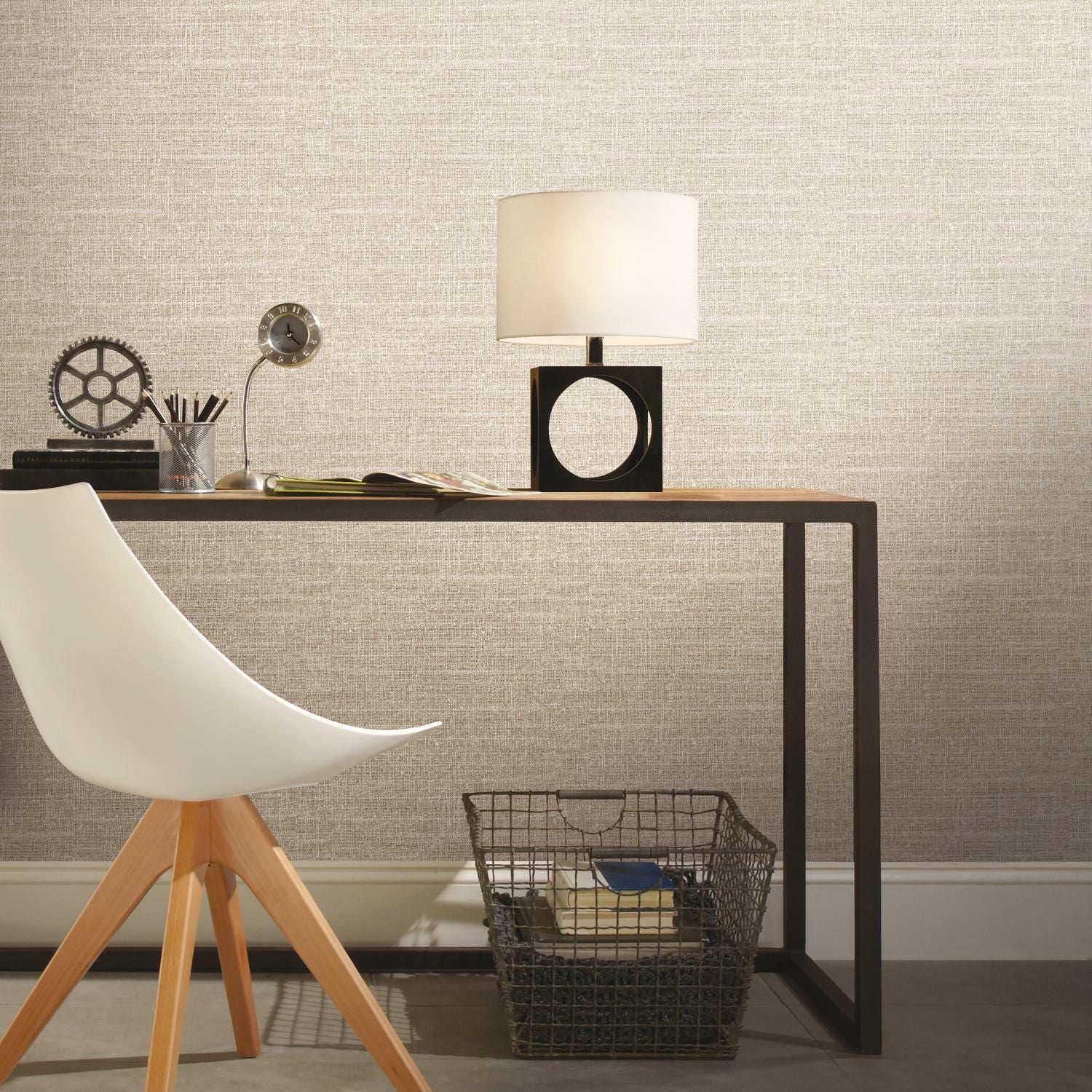 Minimalist modern workspace with brown tweed textured peel and stick wallpaper and sleek desk accessories