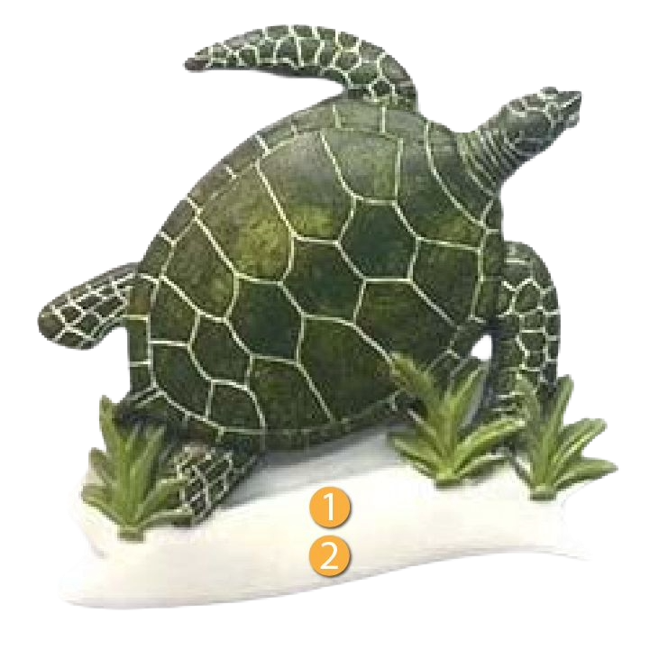 Green sea turtle ornament on white base with seaweed accents for Christmas tree décor under fifty dollars