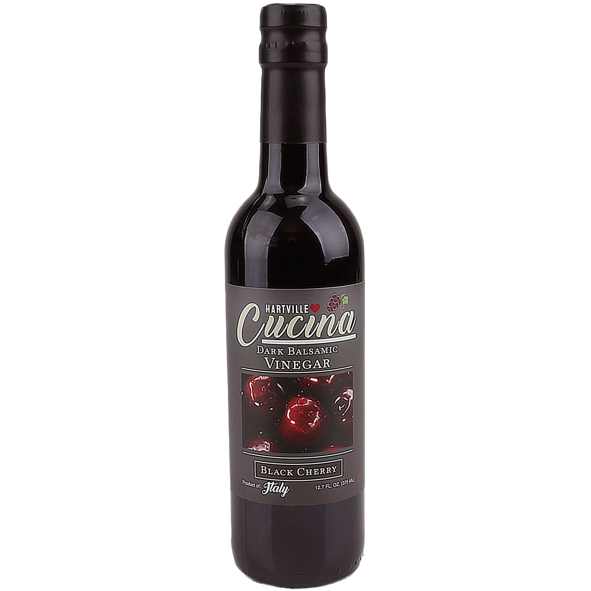 Dark glass bottle of black cherry flavored dark balsamic vinegar with detailed label design