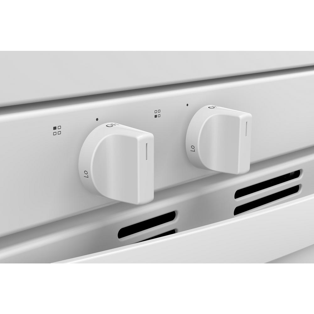 Close-up of white control knobs on 30-inch gas range from Ranges & Cooktops collection at Hartville Hardware