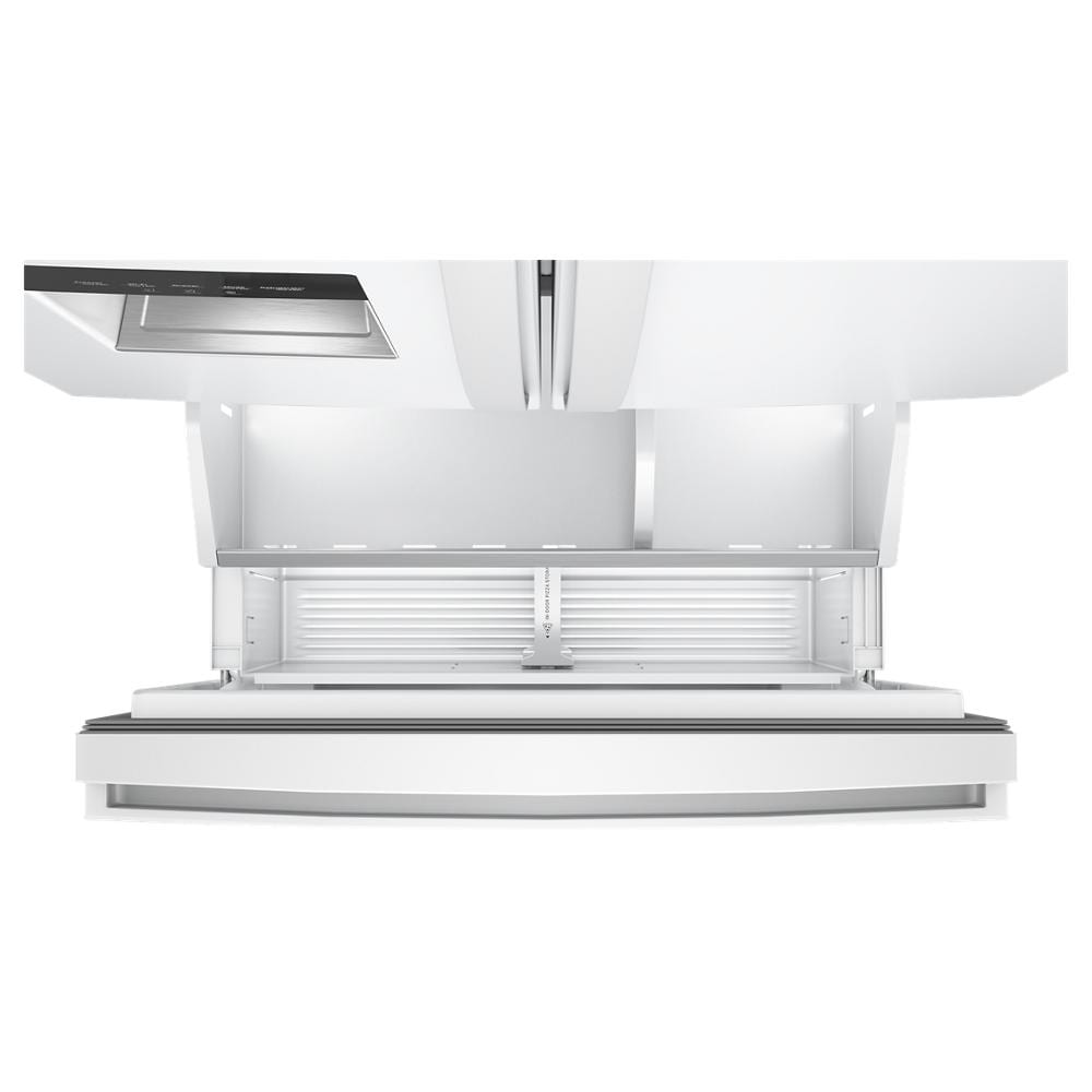 Open bottom freezer drawer in a white French door refrigerator from the kitchen appliances collection