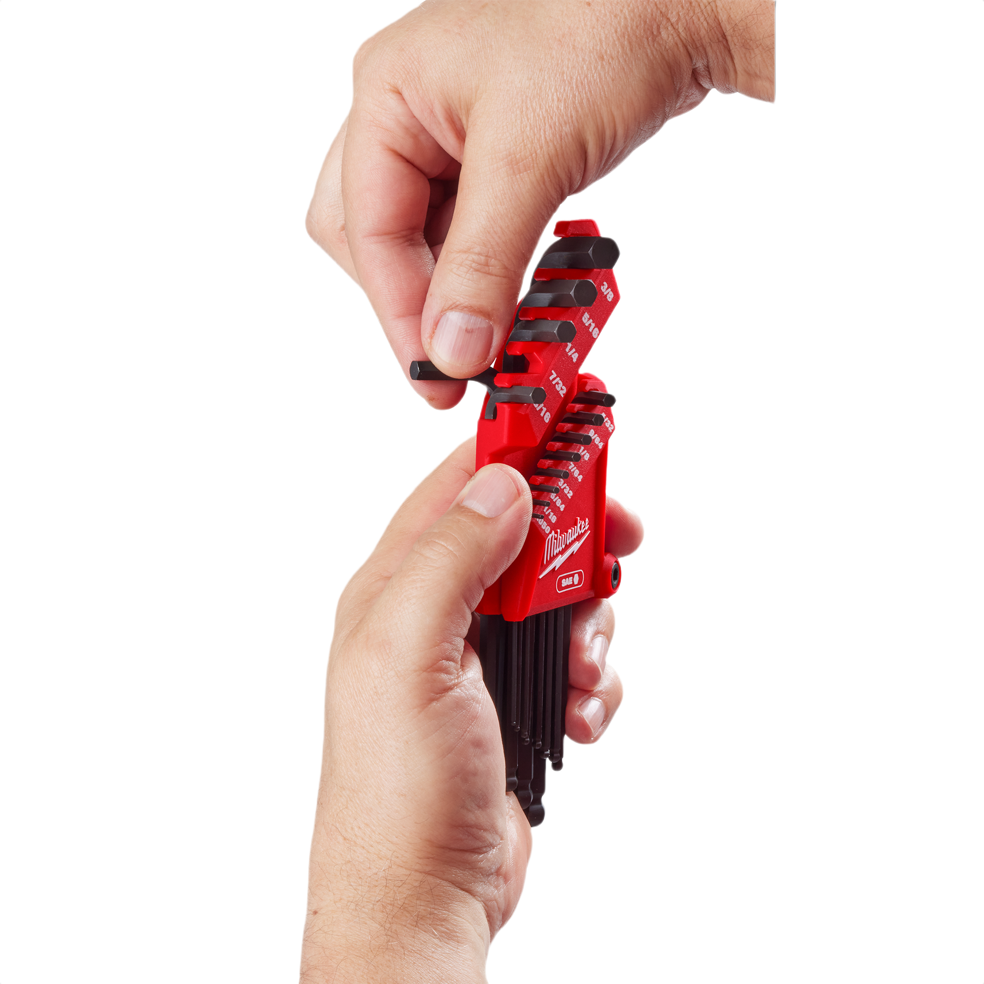 Hands holding a red Milwaukee 13-key ball end L-key set with black hex keys for home improvement tools use