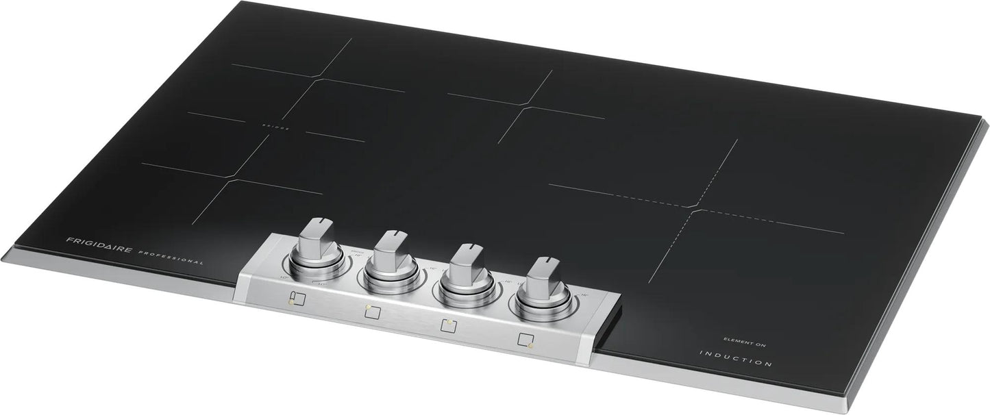 Black induction cooktop with four stainless steel control knobs, part of Cooktops and Kitchen & Kitchenware collections