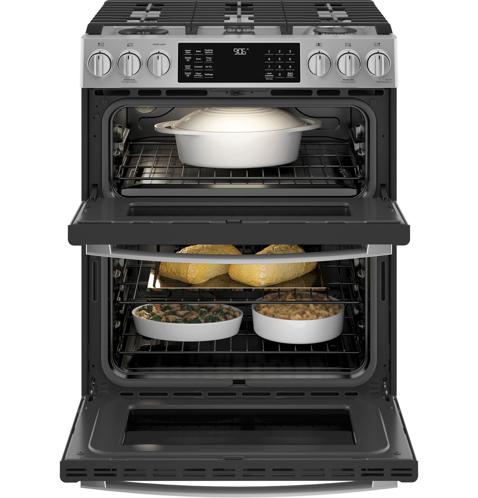 Stainless steel gas range with double convection ovens and front controls, shown with dishes inside in Appliances collection