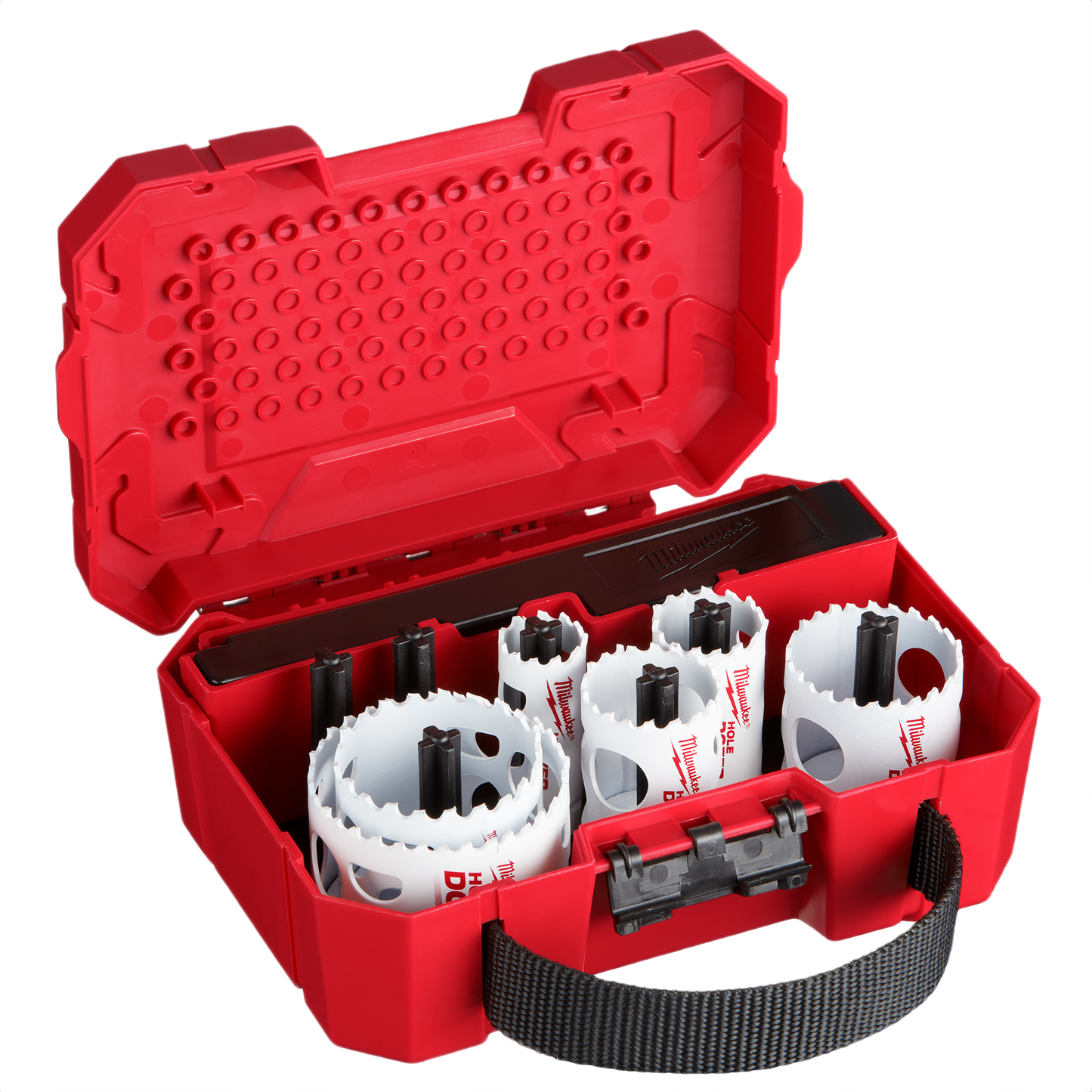 Red plastic carrying case holding a hole saw kit with multiple metal saw blades for woodworking tools.