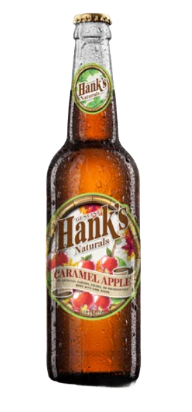 Brown glass bottle of caramel apple flavored cream soda with label and condensation droplets