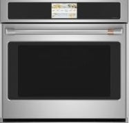 Stainless steel smart single wall oven with convection, sleek handle, and digital control panel in kitchen setting