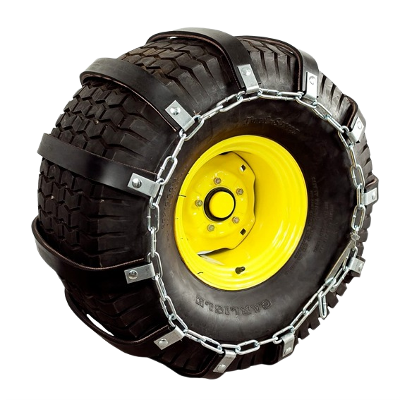 Rubber traction belt with metal chain and black straps mounted on heavy-duty off-road tire and yellow rim