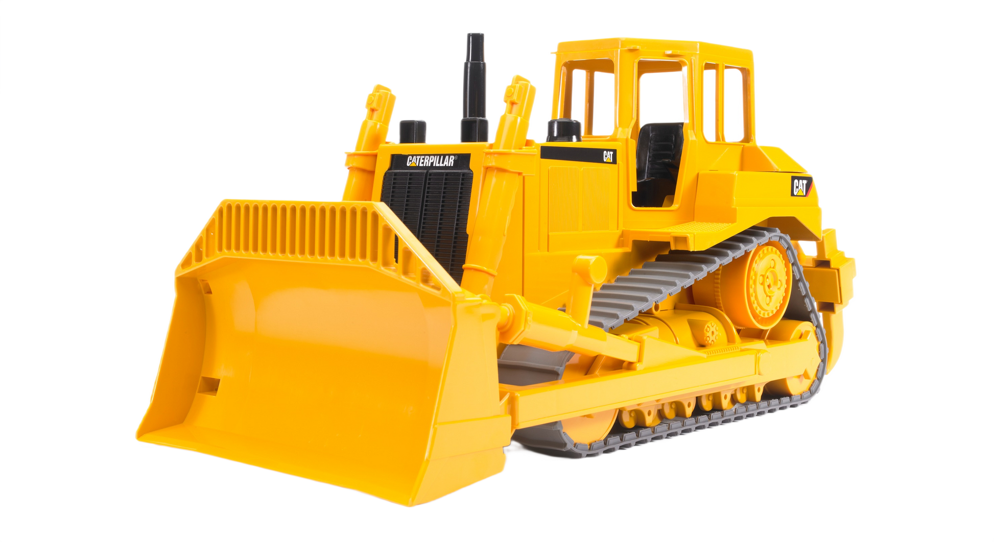 Yellow Bruder Caterpillar bulldozer toy with detailed tracks and large front blade for realistic construction play