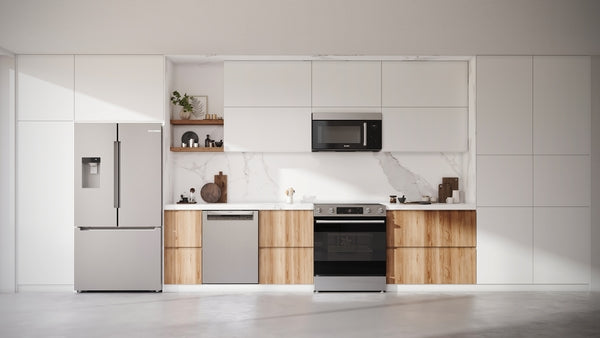 Contemporary kitchen featuring a stainless steel electric range, matching refrigerator, dishwasher, and wood-accent cabinetry in appliances collection