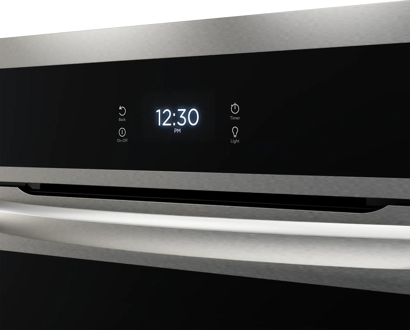 Close-up of stainless steel wall oven digital control panel showing clock, timer, and light functions from Wall Ovens collection