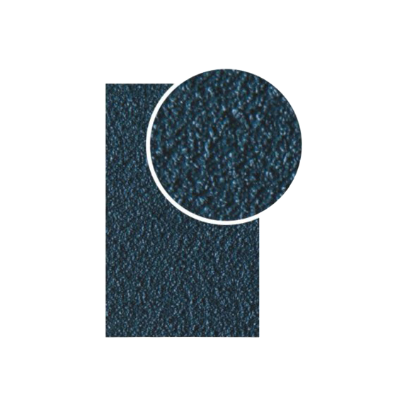 Close-up view of a dark blue zirconium abrasive belt surface for durable tool sharpening in home improvement projects