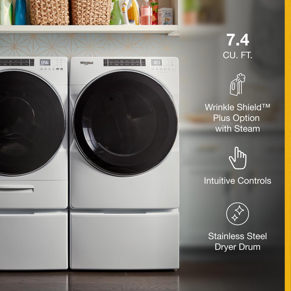 Pair of white front load washer and gas dryer units with digital controls in a modern laundry setting, Dryers collection