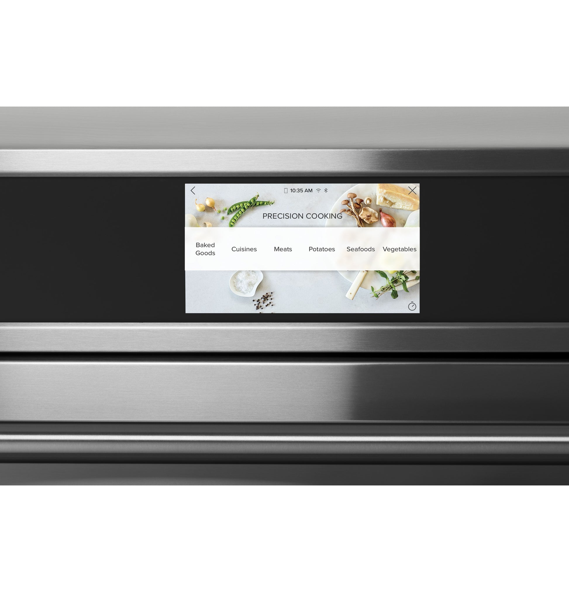 Touchscreen control panel on stainless steel smart double wall oven showing cooking category options from appliances collection