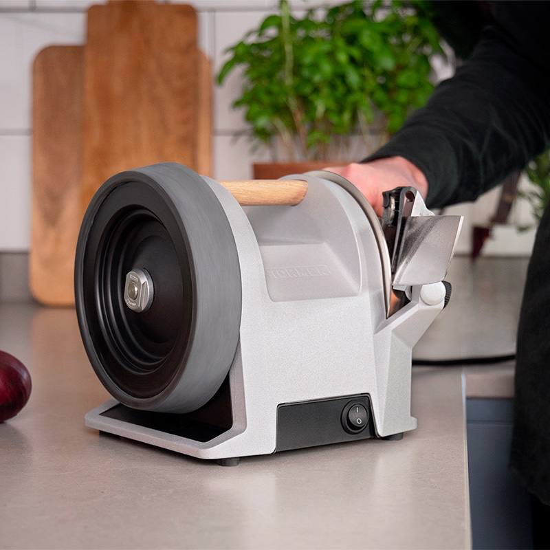 Zinc gray kitchen knife sharpener with wooden handle, designed for home chefs in woodworking tools and sharpeners collection