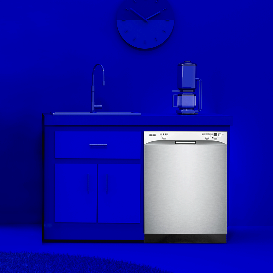 stainless steel built-in dishwasher with front controls installed under kitchen countertop next to blue cabinetry and sink