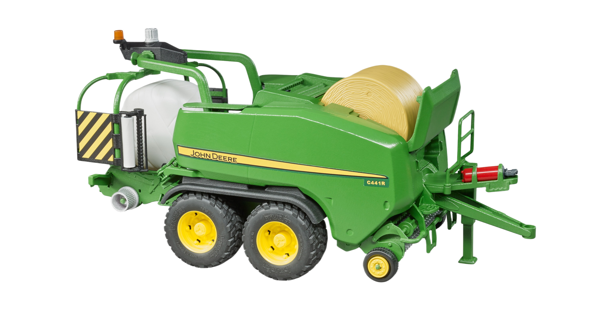 Green and yellow toy wrapping chamber baler with white bale from Bruder Toys in Vehicles & Remote Controlled Toys collection