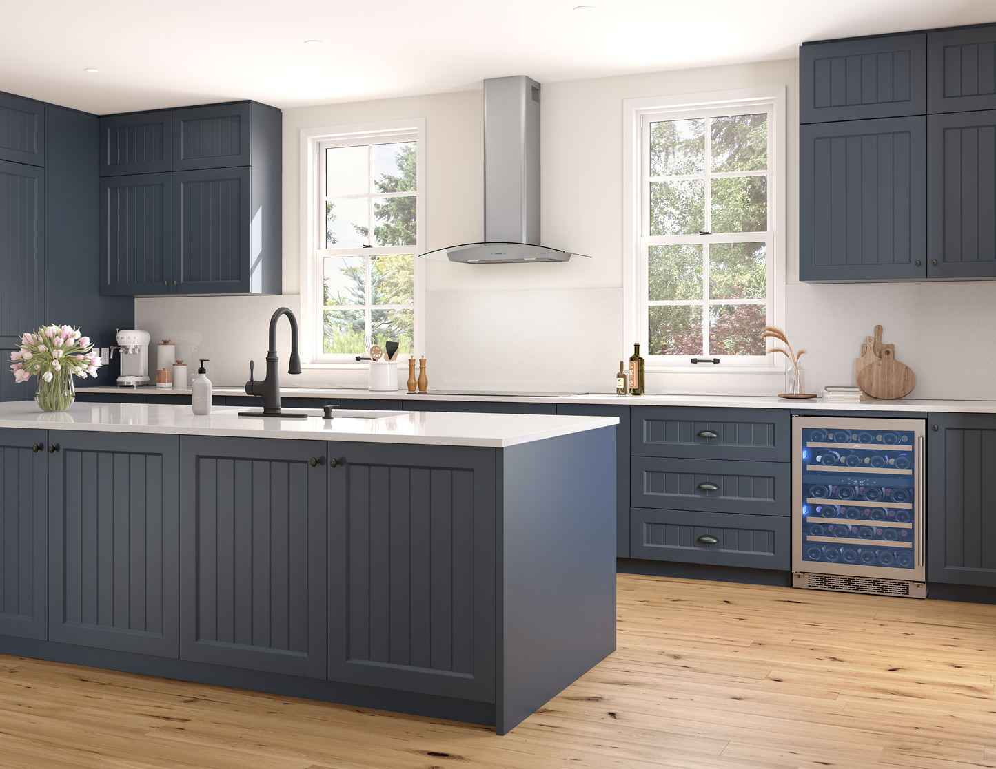 Contemporary kitchen with navy blue cabinets, white countertops, stainless steel chimney hood, and built-in wine cooler from appliances collection
