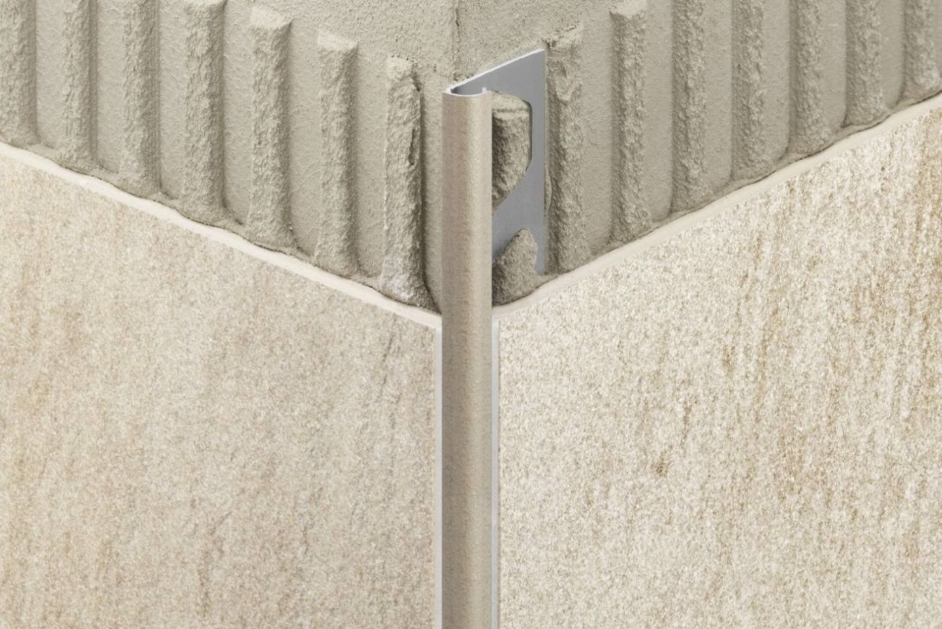 Brushed nickel edge trim with rounded reveal for tile corners, suitable for Flooring & Rugs and Tile Flooring collections under $50