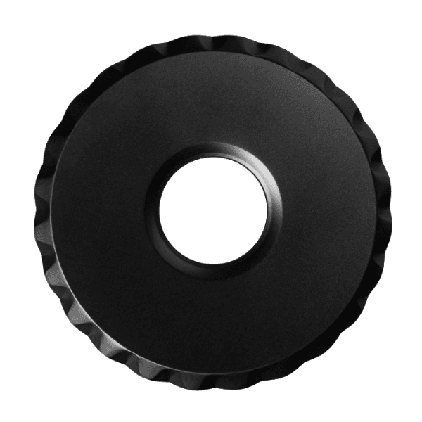 Black carbon steel drip catcher with scalloped edge designed for kitchenware and bakeware collections