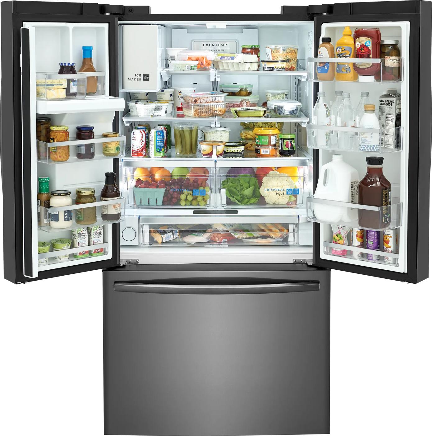 Open stainless steel french door refrigerator with organized fresh produce, beverages, and condiments for kitchen appliance collection