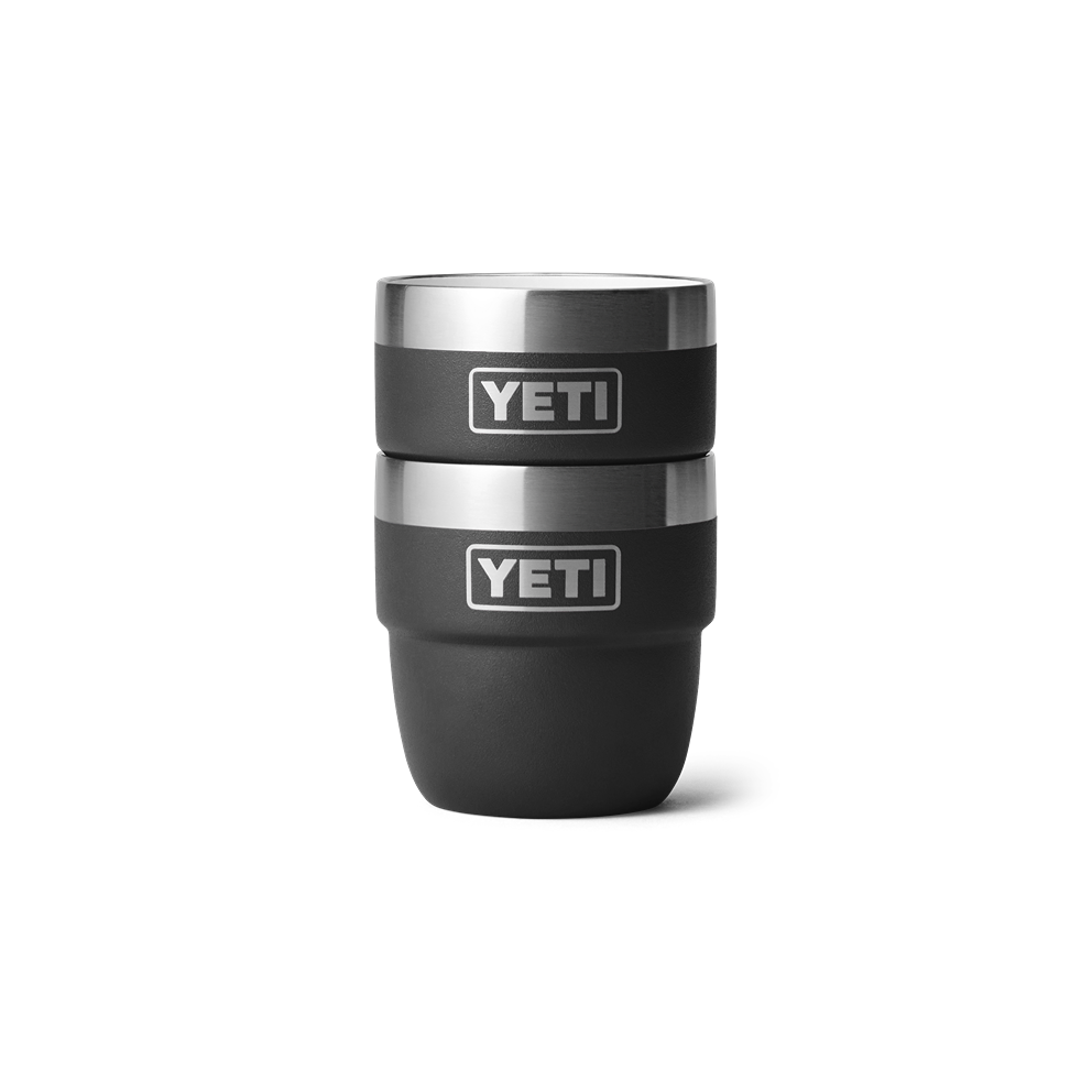 Two black insulated stackable cups with stainless steel rims designed for durable drinkware use and outdoor activities