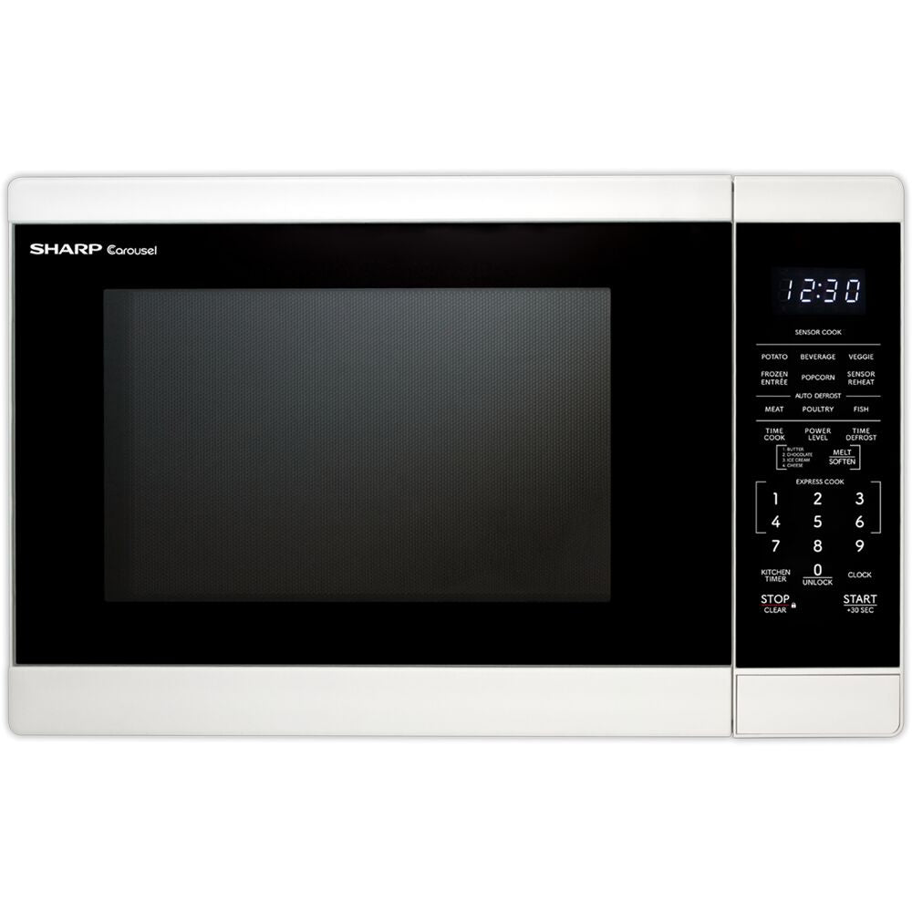 White countertop microwave oven with digital control panel showing sensor cook and preset settings in kitchen appliances collection