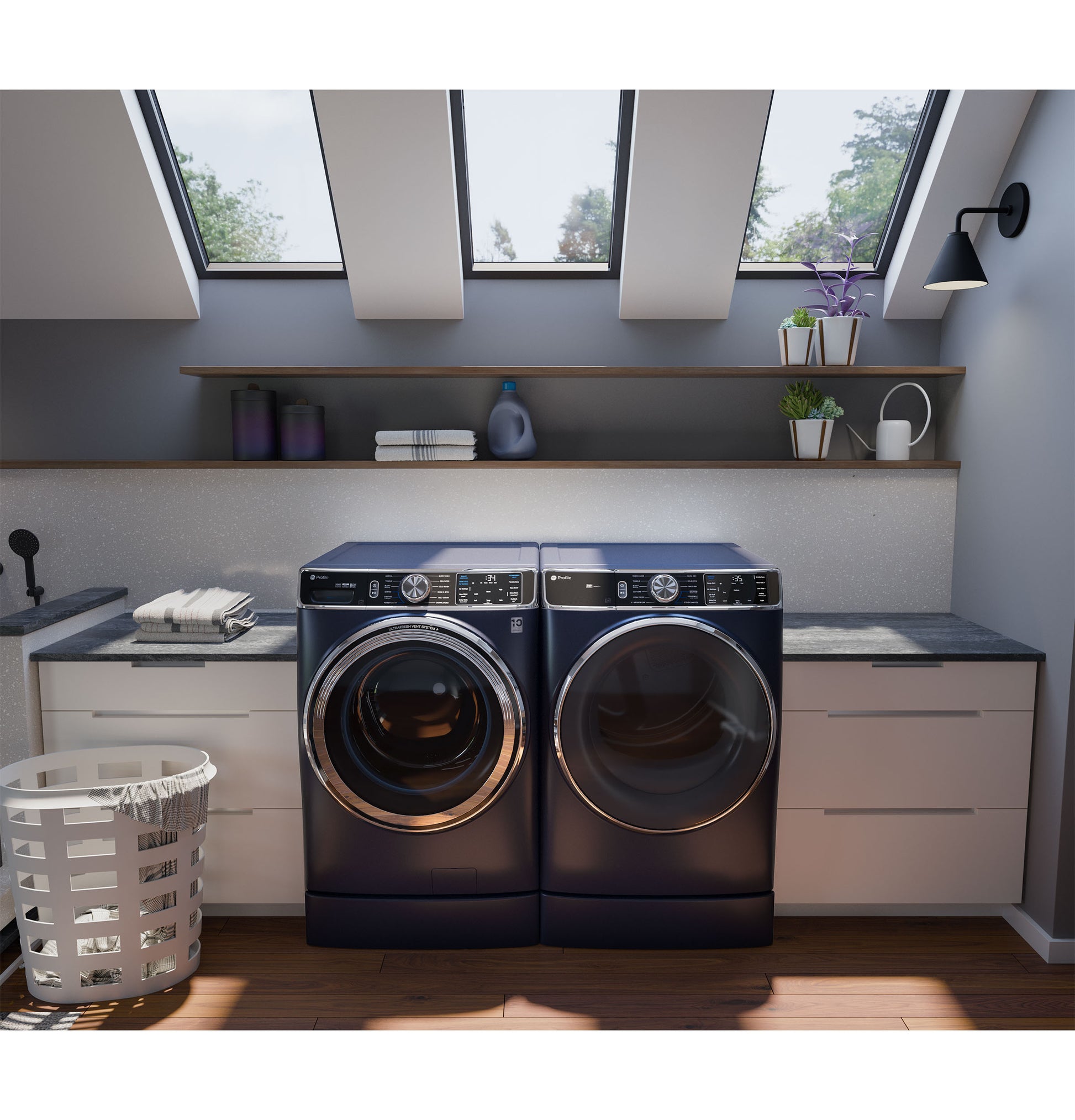 Front-load dark blue washer and dryer set on 7-inch risers in a bright laundry room with modern home improvement features