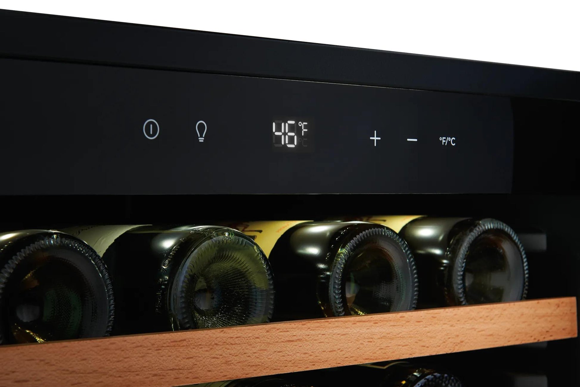 Digital temperature display set to 46 degrees on black wine cooler with wooden shelving in kitchen appliances collection