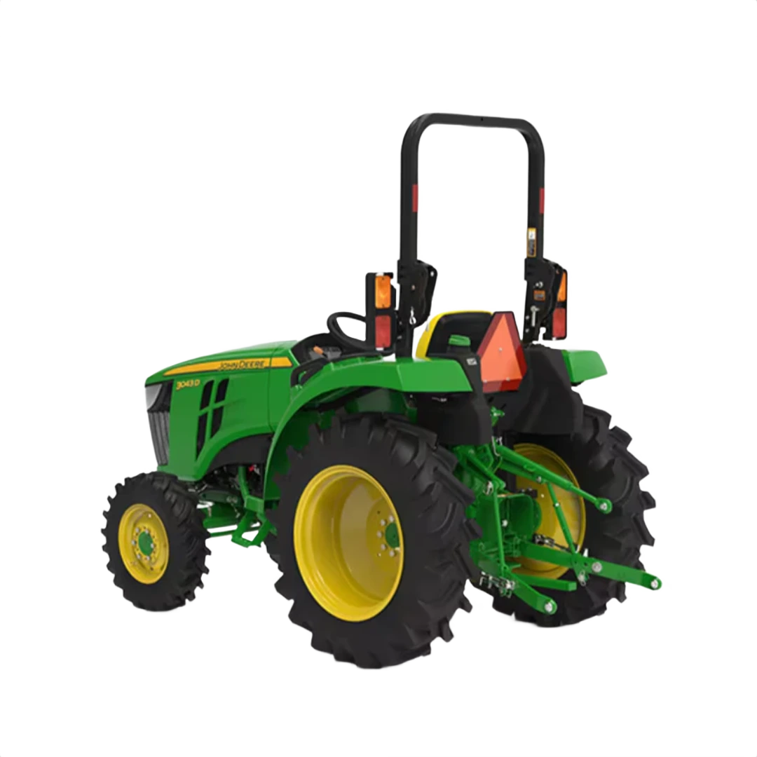 Green and yellow compact tractor with rollover protection and rear hitch for agricultural and home improvement use