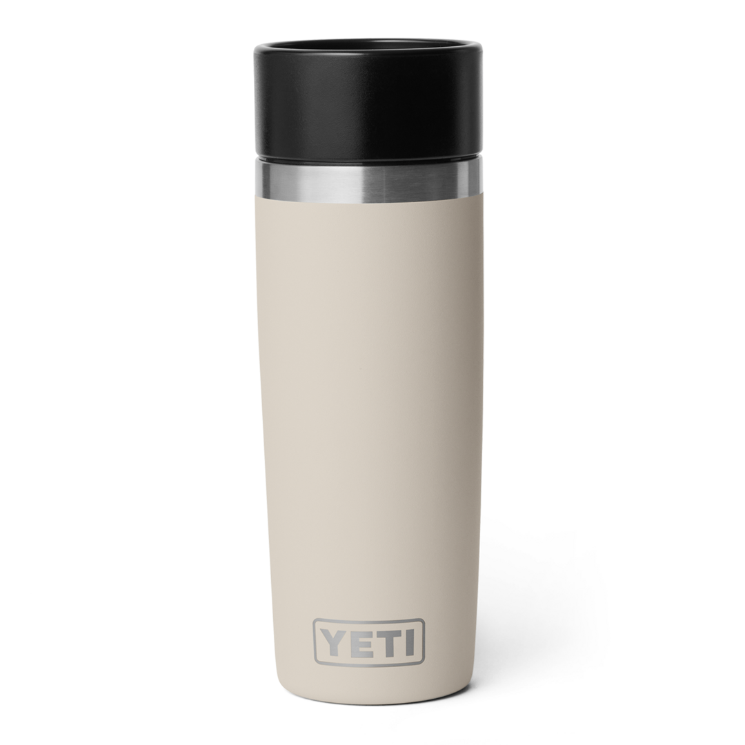 Beige insulated 16 oz. travel bottle with stainless steel detail and durable double-wall vacuum insulation in drinkware collection
