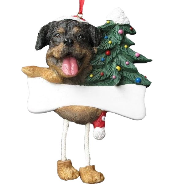 Playful Rottweiler Christmas ornament with dangling legs holding a decorated tree and blank sign for personalization.