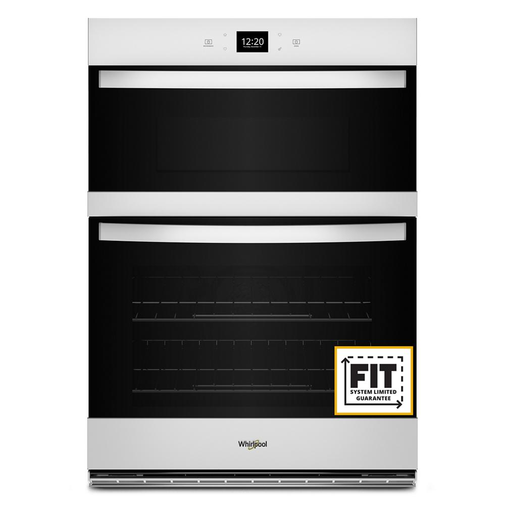 White and black combo wall oven with digital clock and stainless accents from kitchen appliances collection