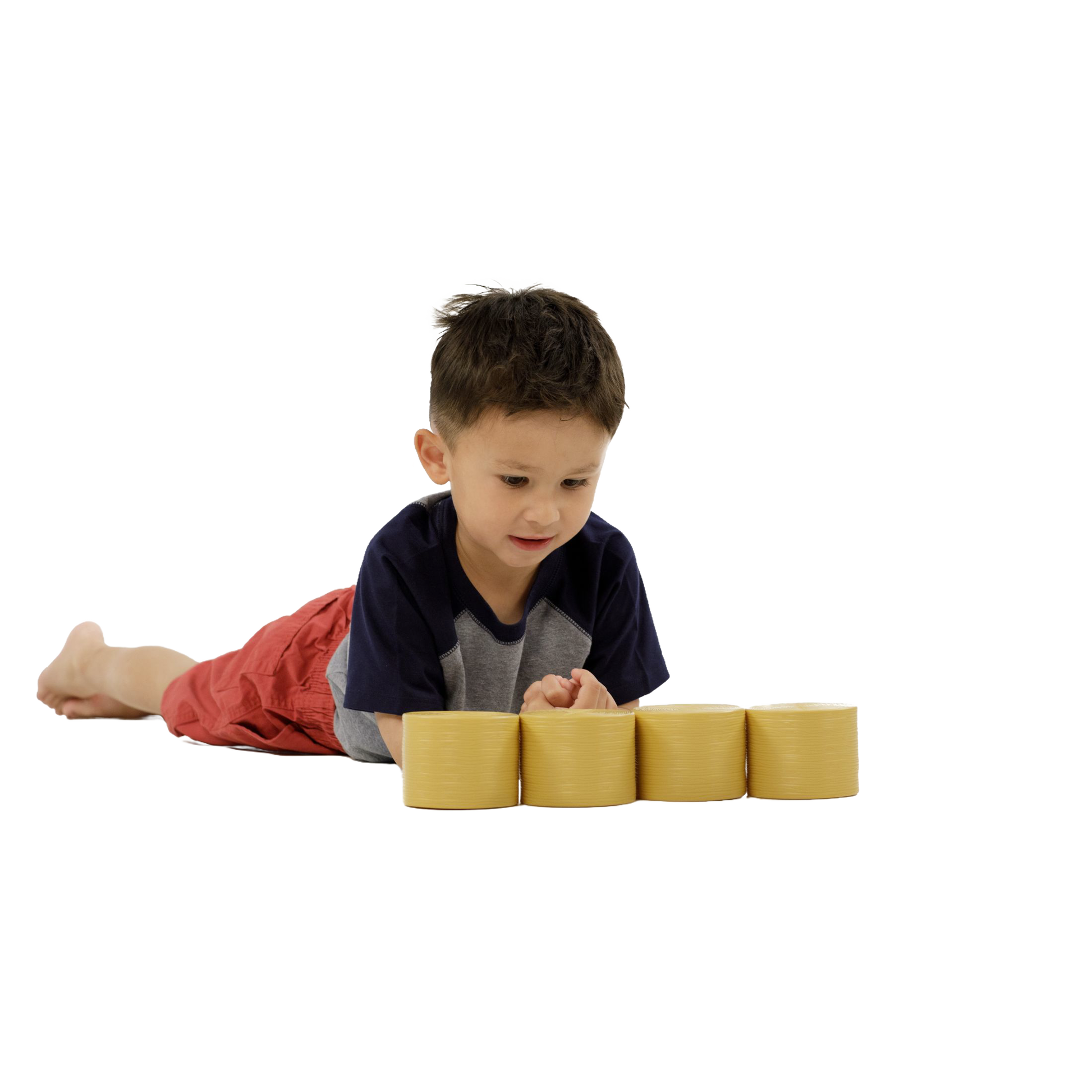 Young boy lying down playing with four ochre-brown round bales toy in Vehicles & Remote Controlled Toys collection under $50