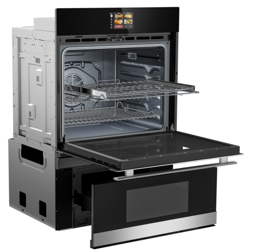 Open black and stainless steel smart wall oven with convection interior and digital display panel in kitchen appliance setting