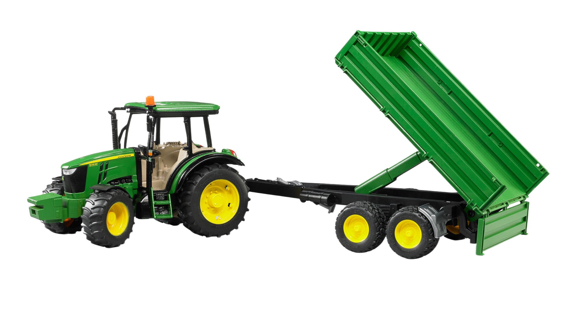 Green Bruder tractor model with yellow wheels hooked to a tilt trailer for realistic farm play scenes