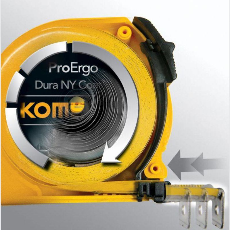 Close-up of yellow Komelon tape measure housing showing the nylon-coated steel blade retraction in hand tools and measuring tapes collections