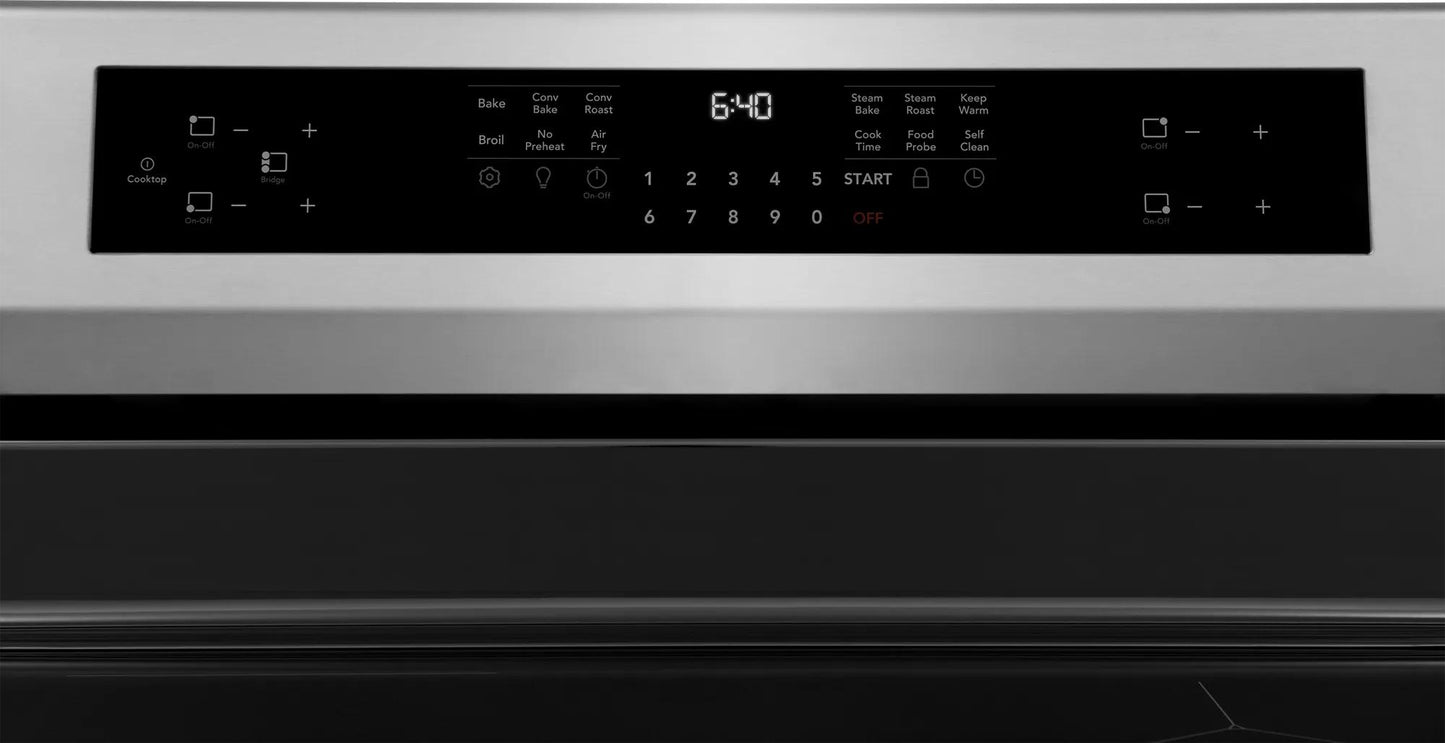 Control panel with digital display and touch buttons on stainless steel induction range in Ranges & Kitchen & Kitchenware collections