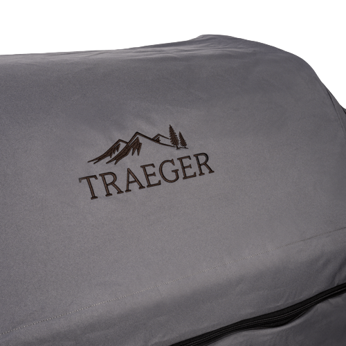 Gray full-length grill cover made from heavy-duty polyester, designed for Traeger Timberline XL in outdoor living spaces