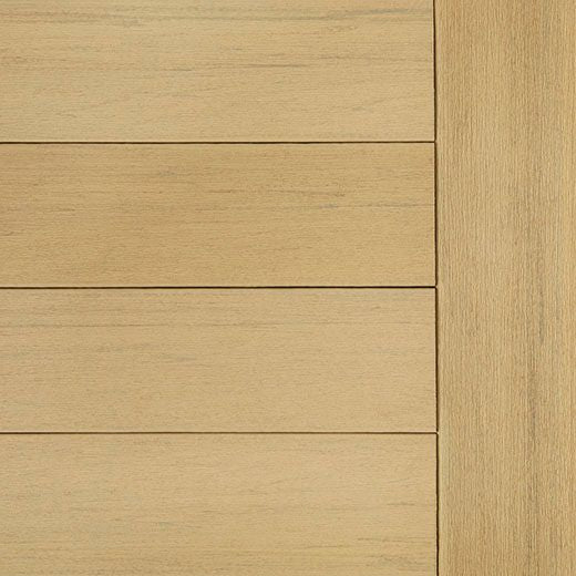 Close-up of natural white oak composite decking boards arranged in a grooved pattern for home improvement projects