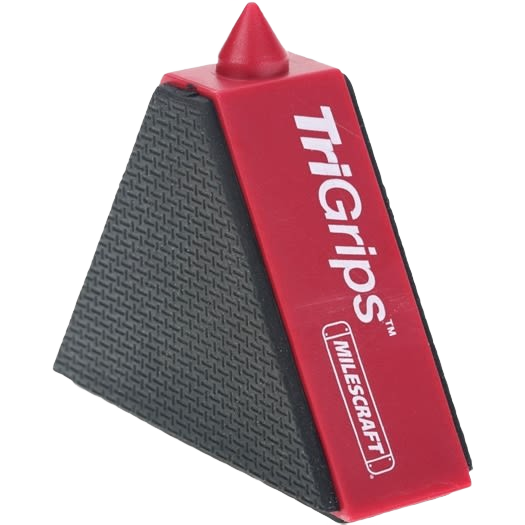 Red and black triangular work support wedge with textured grip for tools and home improvement projects