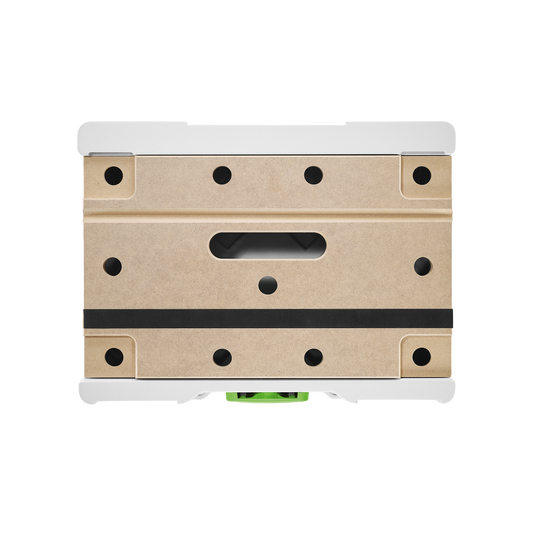 Top view of a compact modular storage box featuring a perforated wooden surface with a central handle and protective white edges, part of an interlocking system for tool storage and workshop organization.