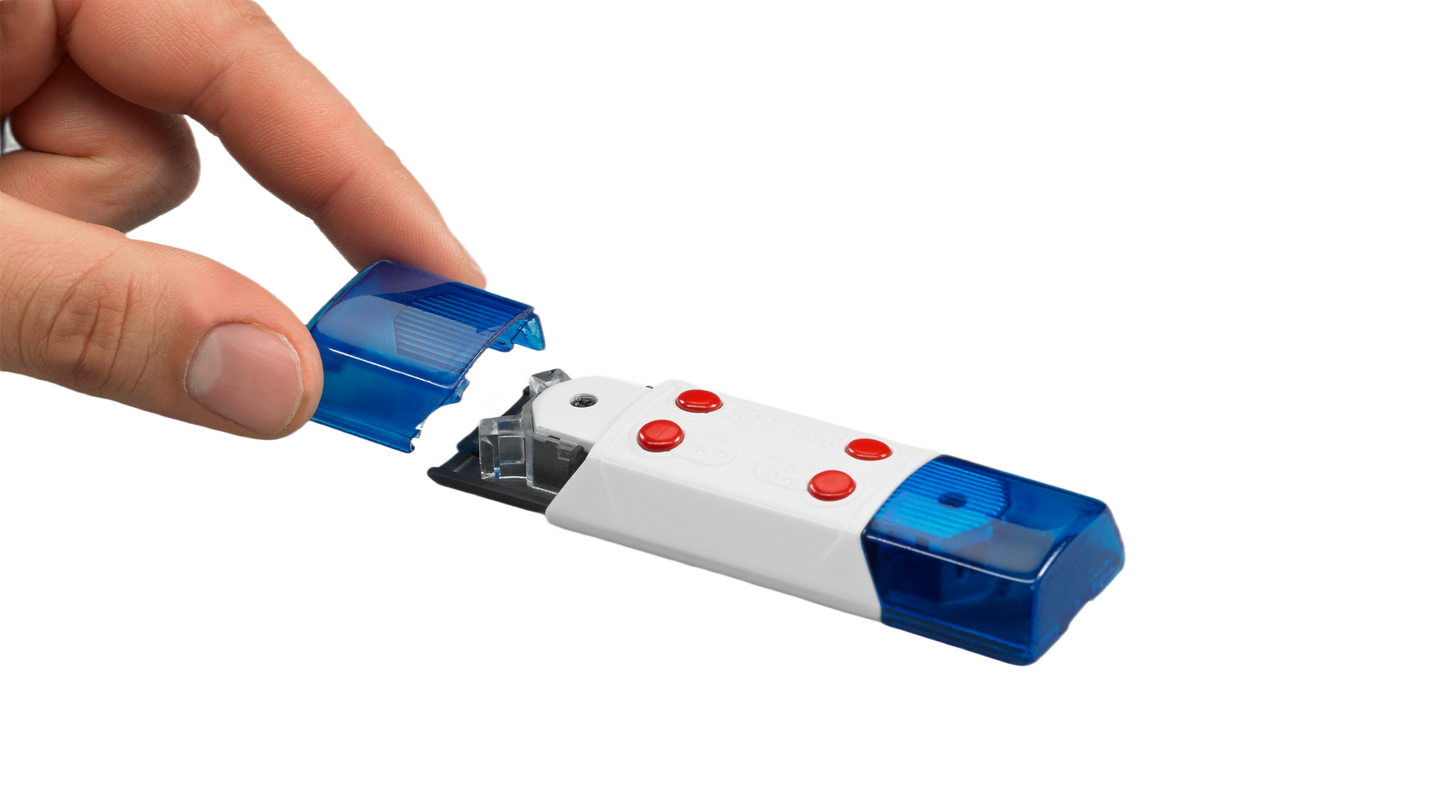 Hand holding blue light cover on white Bruder light and sound module for toy cars in Vehicles & Remote Controlled Toys collection